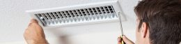 technician removing air vent cover